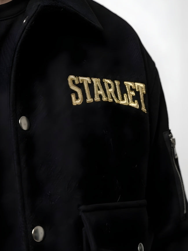 Black jacket with 'STARLET' embroidered on it against a white background