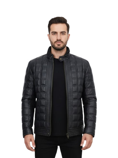 Man wearing a black quilted jacket on a white background