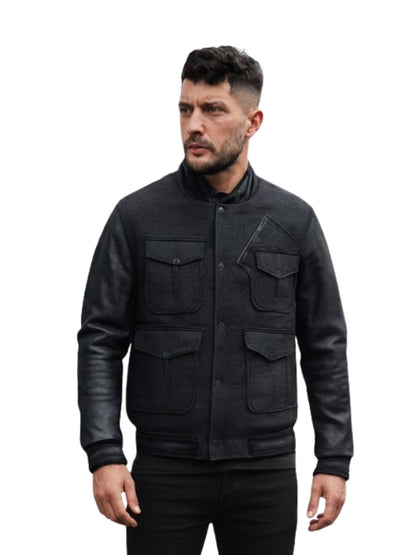 Man wearing a black jacket on a white background