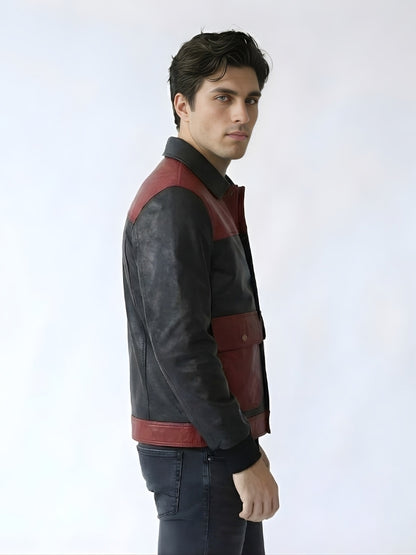 Man wearing a black and red leather jacket on a white background