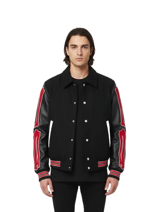Man wearing a black jacket with red accents on a white background