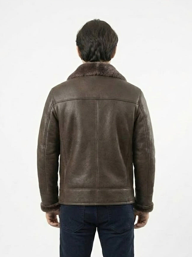 Man wearing a brown leather jacket with fur collar on a white background