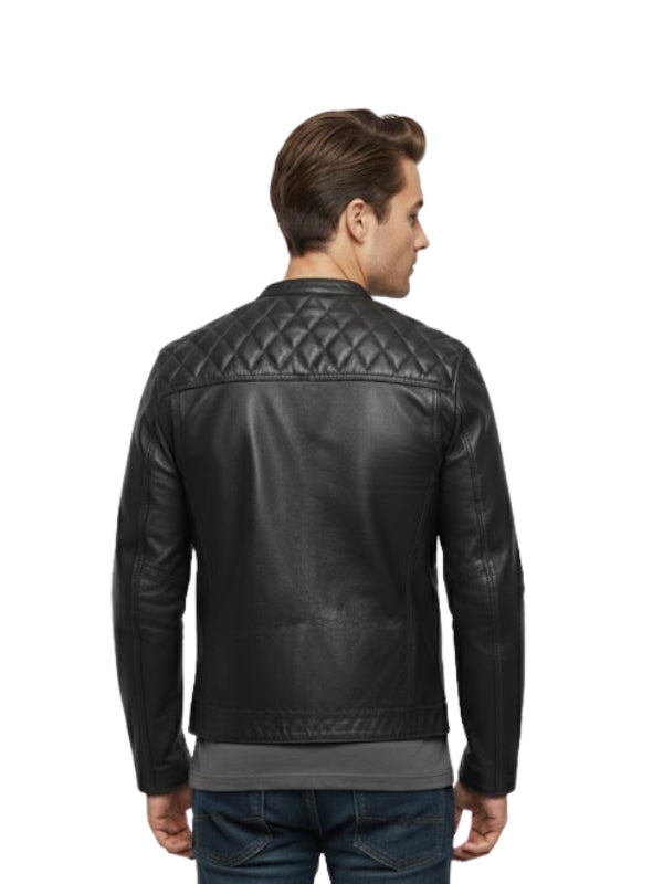 Man wearing a black leather jacket with quilted design on a white background