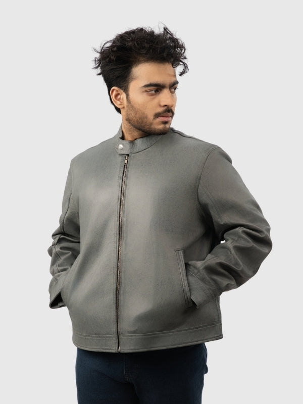 Man wearing a gray jacket on a white background