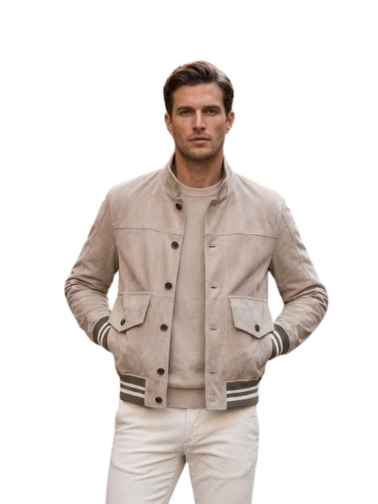 Man wearing a beige varsity jacket on a white background