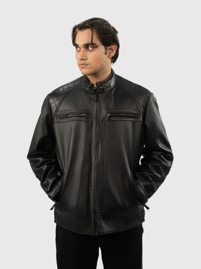 Man wearing a black leather jacket on a white background