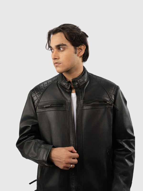 Man wearing a black leather jacket on a white background