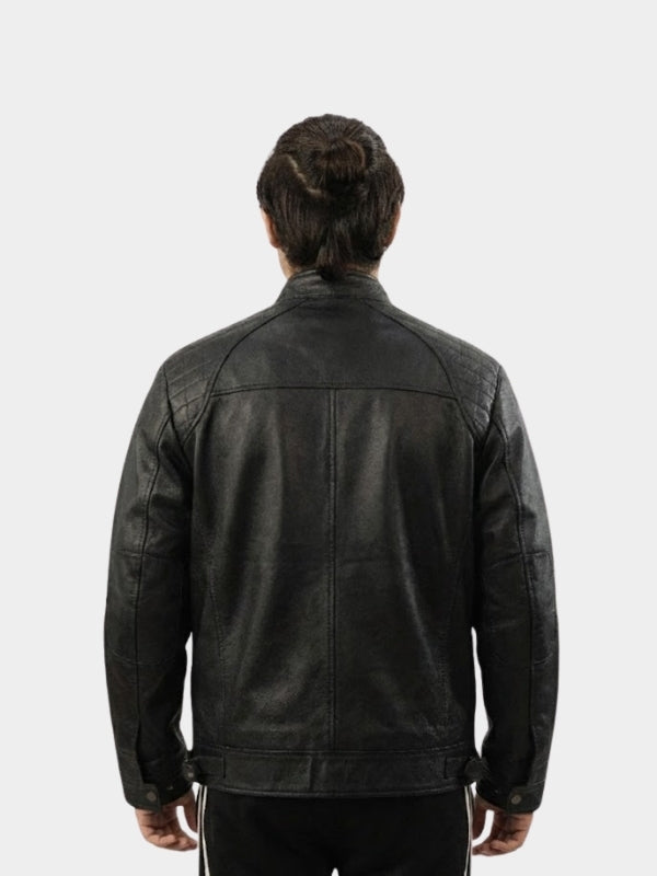 Person wearing a black leather jacket on a white background