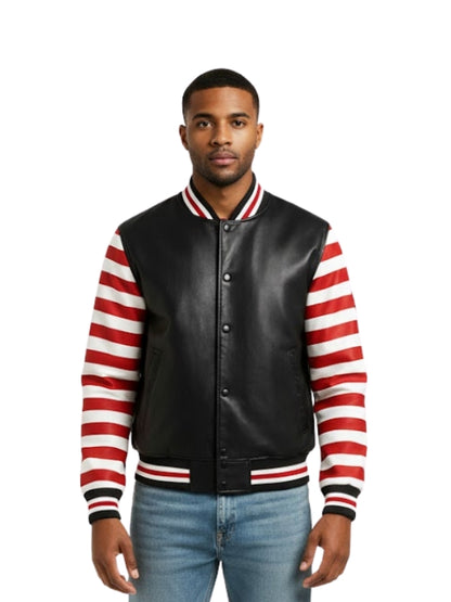 Man wearing a black leather varsity jacket with red and white striped sleeves on a white background