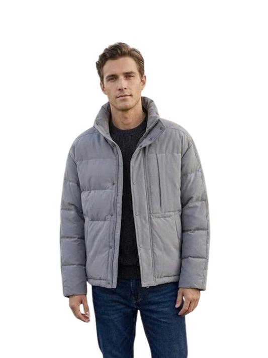 Man wearing a gray puffer jacket on a white background