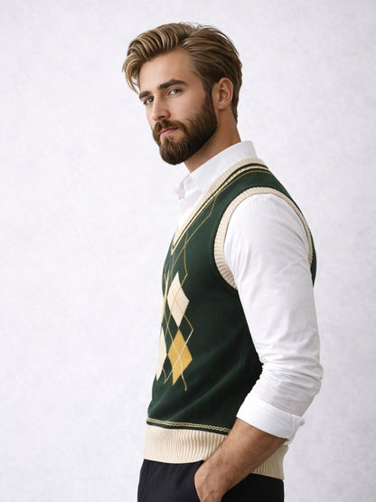 Man wearing a green argyle sweater vest over a white shirt on a light gray background