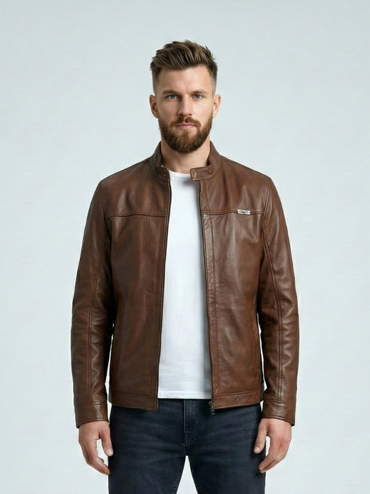 Man wearing a brown leather jacket on a light gray background