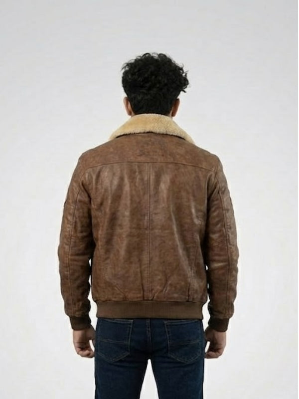 Brown suede jacket with shearling collar worn by a person on a white background