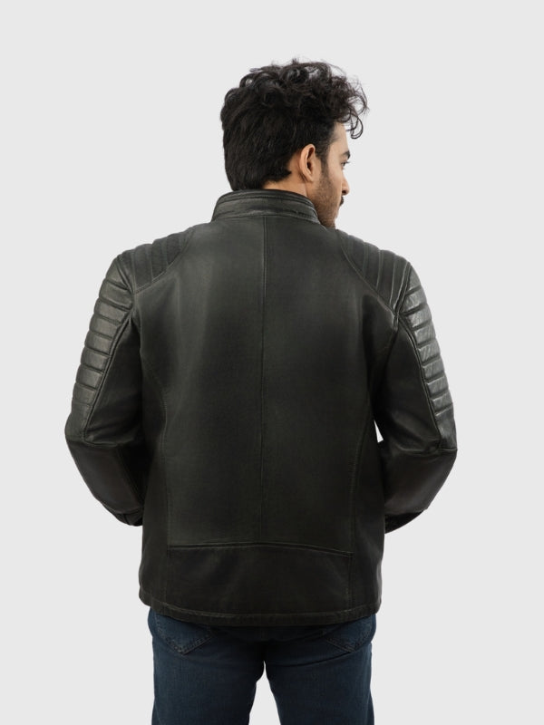 Man wearing a black leather jacket on a white background