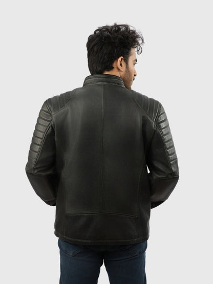 Man wearing a black leather jacket on a white background