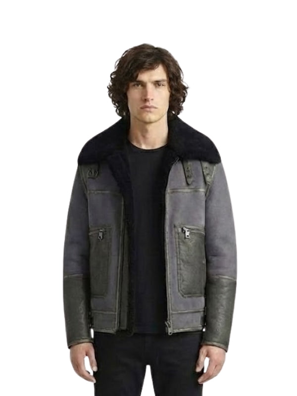 Man wearing a dark gray jacket with black fur collar on a white background