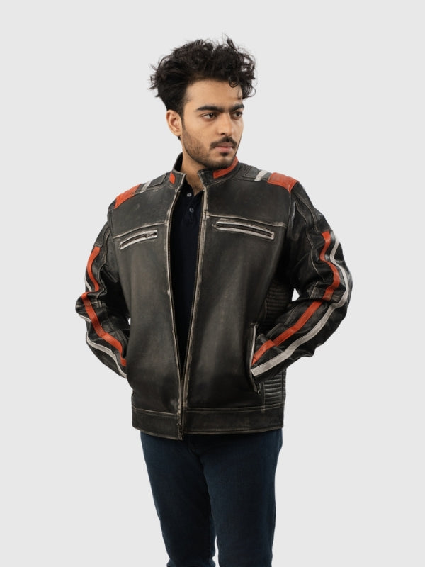 Man wearing a black leather jacket with red accents on a white background