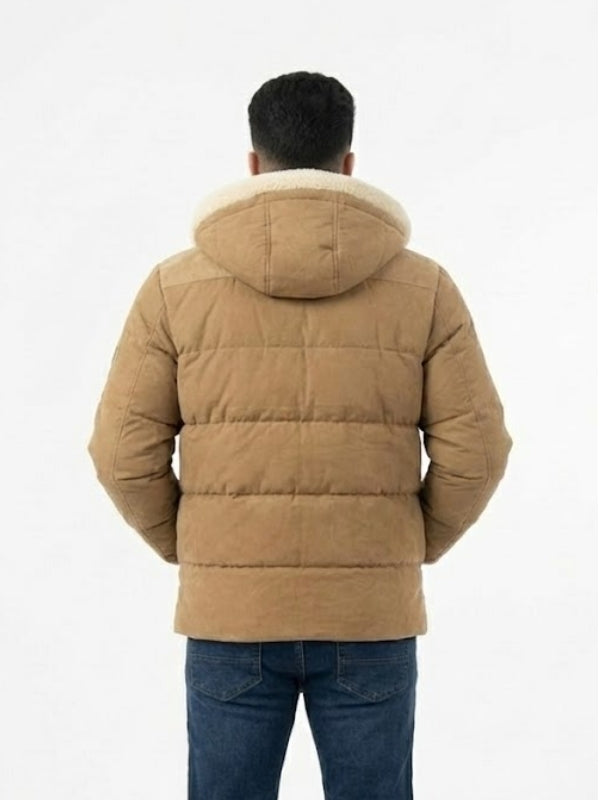 Person wearing a brown puffer jacket with a white background