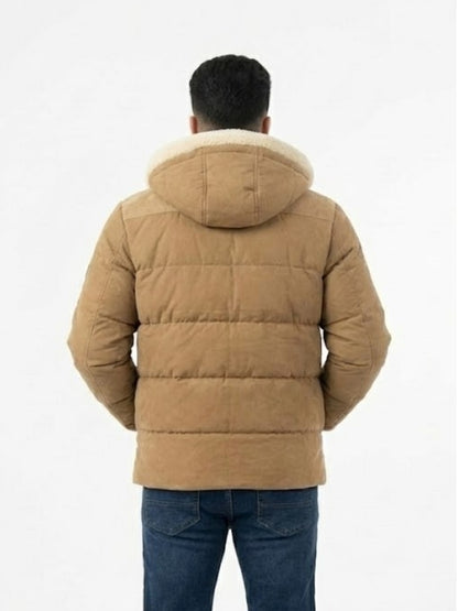 Person wearing a brown puffer jacket with a white background