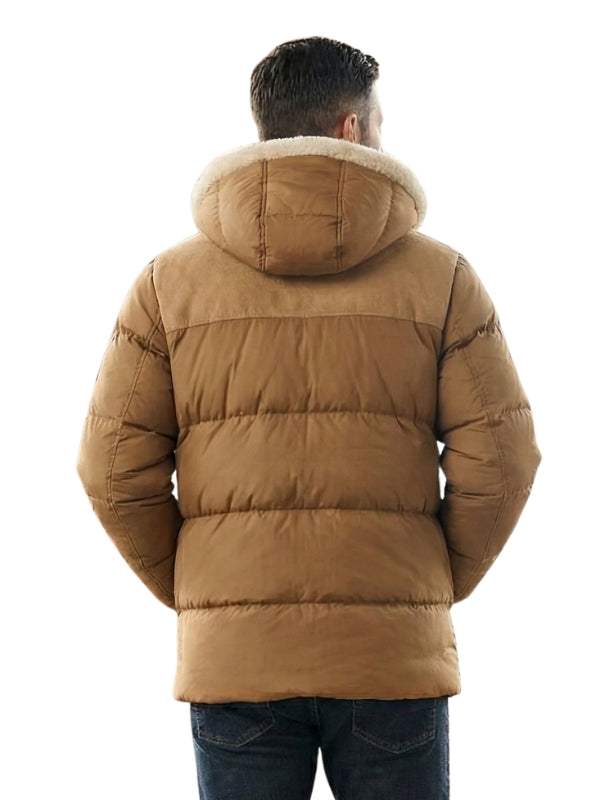 Man wearing a brown puffer jacket with a fur-lined hood on a white background