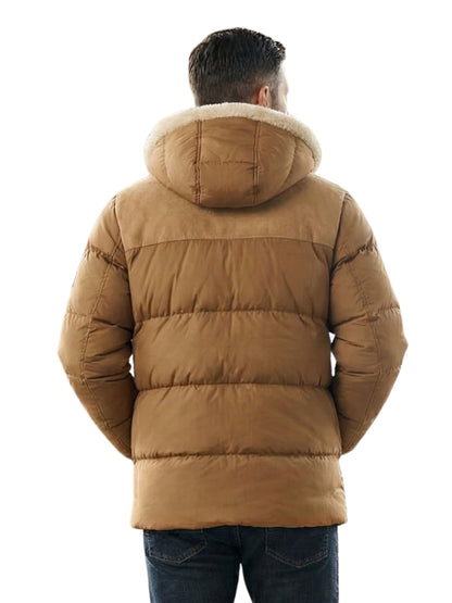 Man wearing a brown puffer jacket with a fur-lined hood on a white background