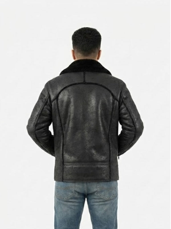 Person wearing a black leather jacket on a white background