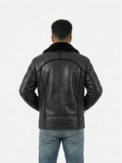 Person wearing a black leather jacket on a white background