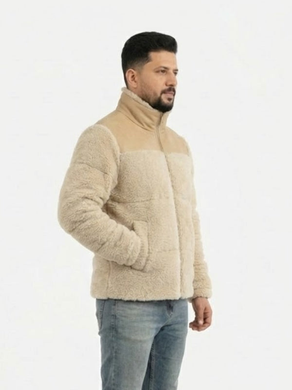 Man wearing a beige fleece jacket on a white background