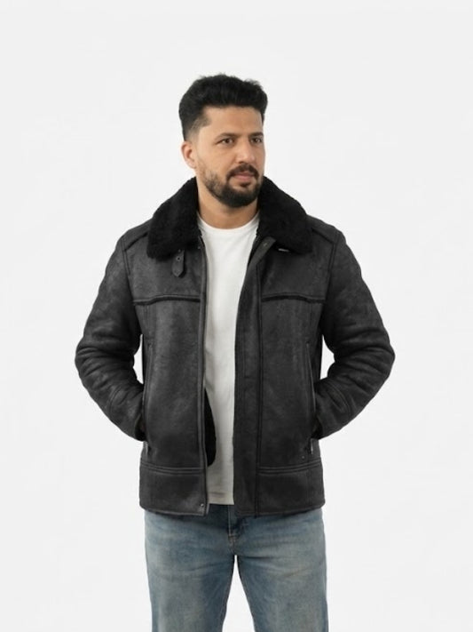 Man wearing a black leather jacket with fur collar on a white background