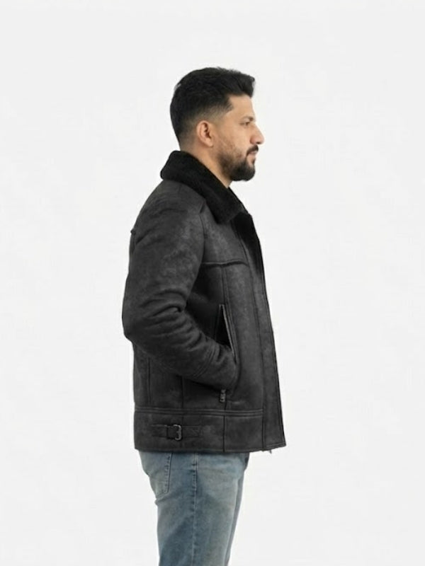 Man wearing a dark gray leather jacket with fur lining on a white background