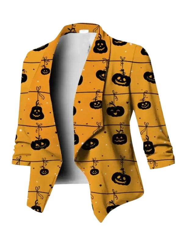Yellow cardigan with black pumpkin pattern on a white background