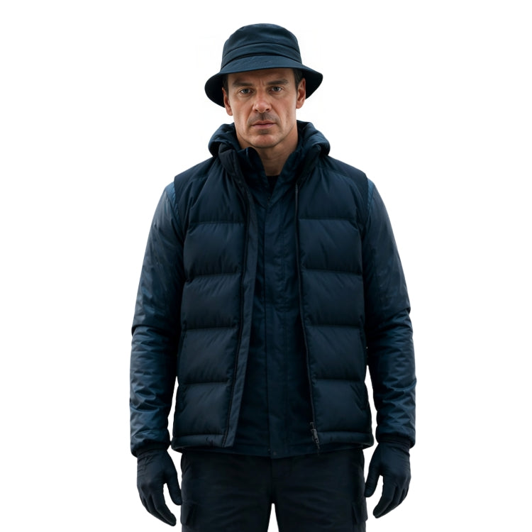 Man wearing a dark blue puffer jacket, hat, and gloves on a white background