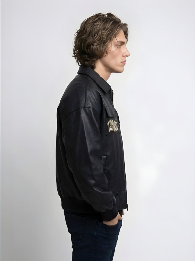 Person wearing a black jacket with text on a white background