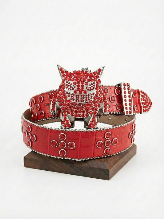 Red belt with a decorative buckle on a white background