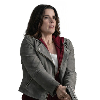 Woman Wearing a grey biker jacket on a white background.