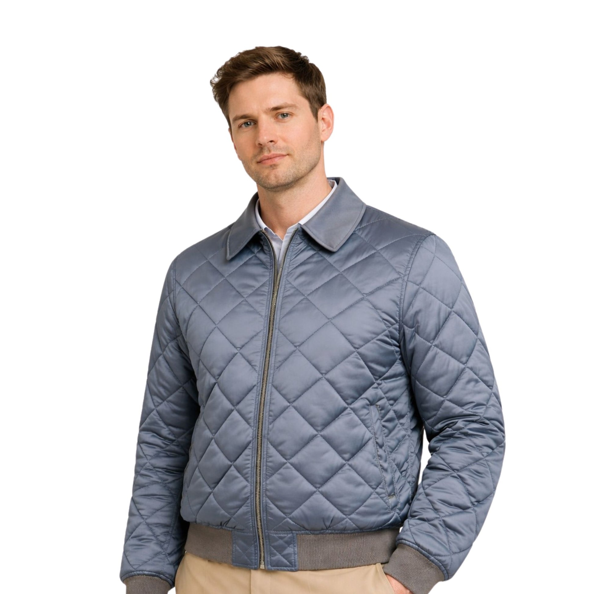 Man wearing a quilted blue jacket on a white background