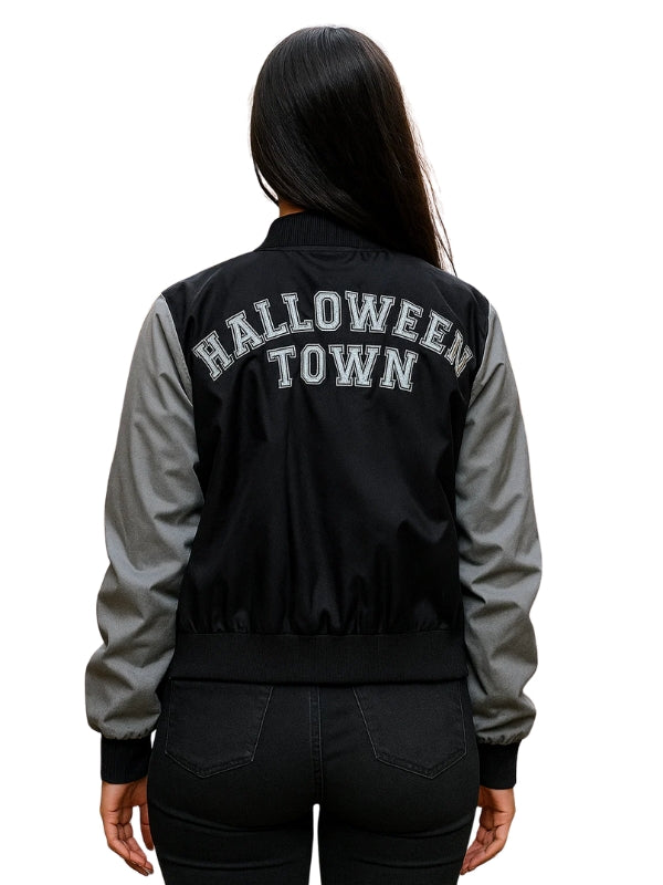 Black and gray jacket with 'HALLOWEEN TOWN' text on the back, worn by a person.
