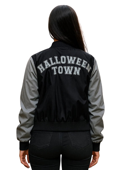Black and gray jacket with 'HALLOWEEN TOWN' text on the back, worn by a person.