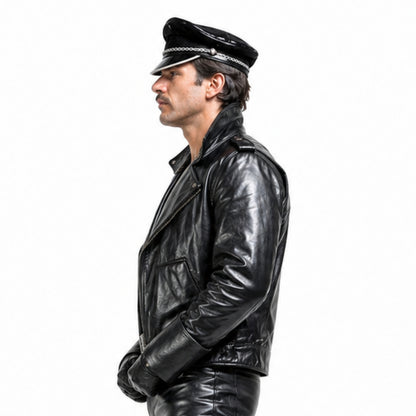 Man wearing a black leather jacket and cap on a white background