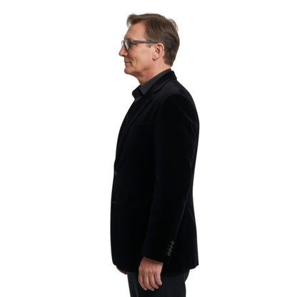 Man wearing a black coat on a white background