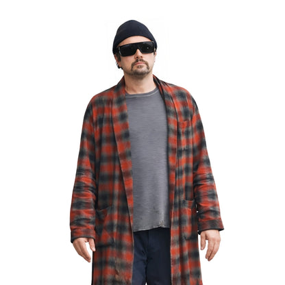 Man wearing a red and black plaid coat over a gray shirt on a white background