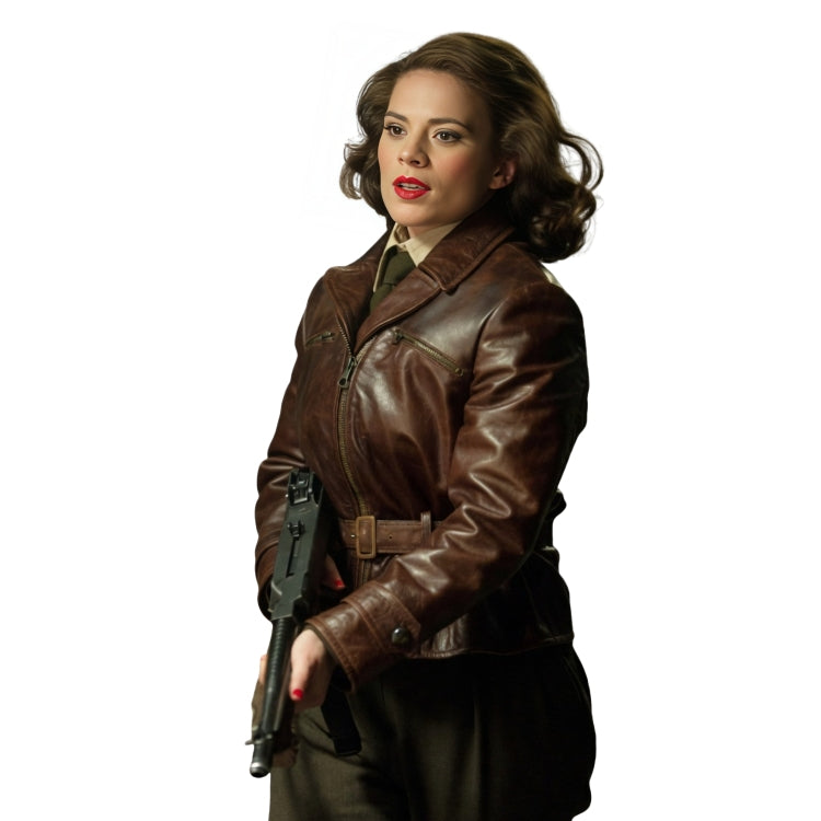 Woman wearing a brown leather jacket holding a gun on a white background