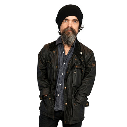 Man wearing a black jacket and beanie on a white background