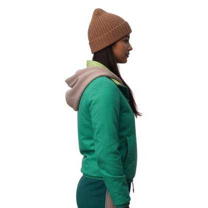 Person wearing a green jacket with a hood and a brown beanie on a white background