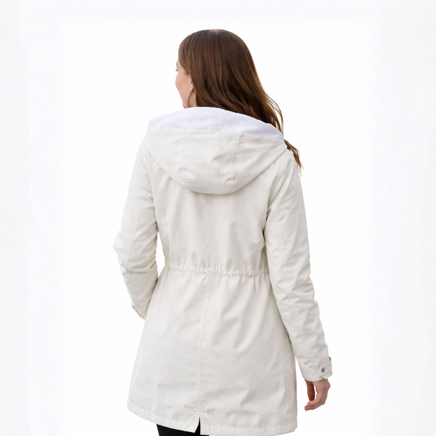 Woman wearing a white coat on a white background