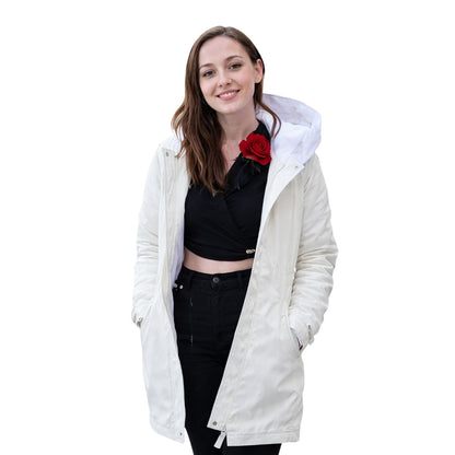 Woman wearing a white hooded jacket on a white background