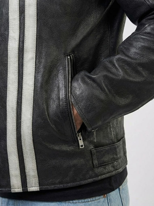 Black leather jacket with white stripes on a gray background