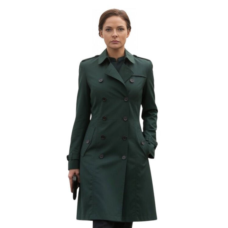Woman wearing a green trench coat on a white background