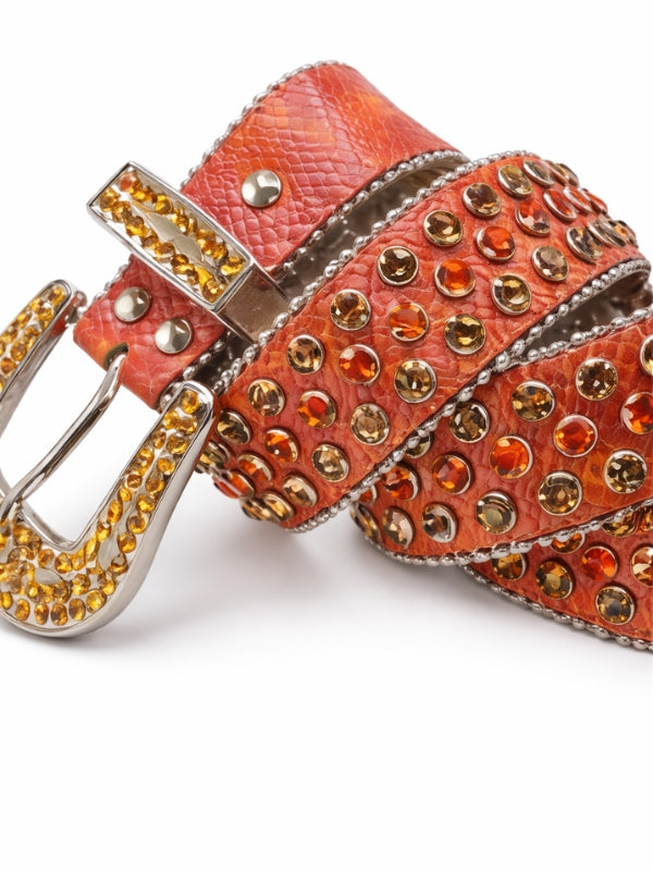 Orange belt with gold and silver embellishments on a white background