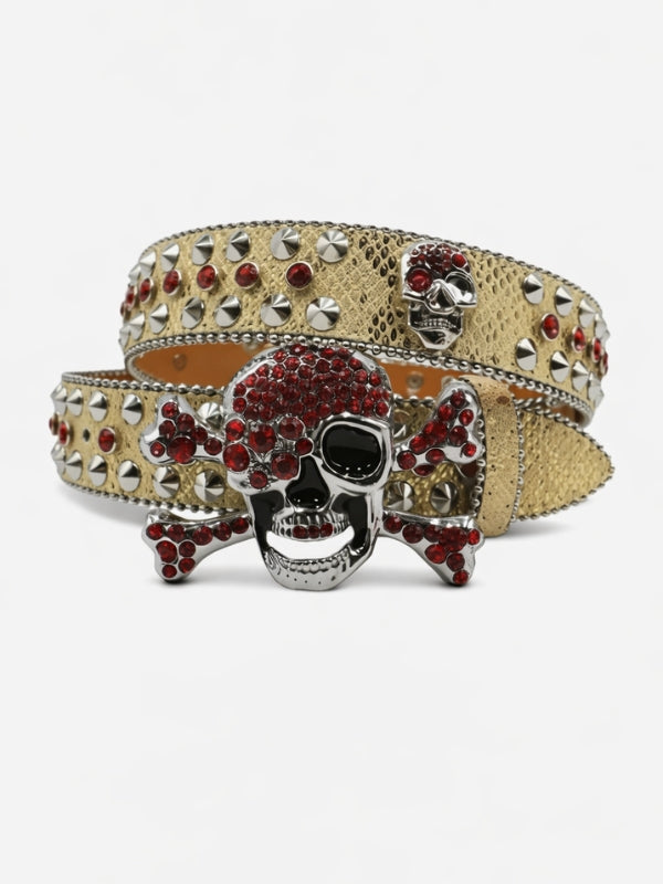 Skull-themed belt with red gemstones and gold accents on a white background